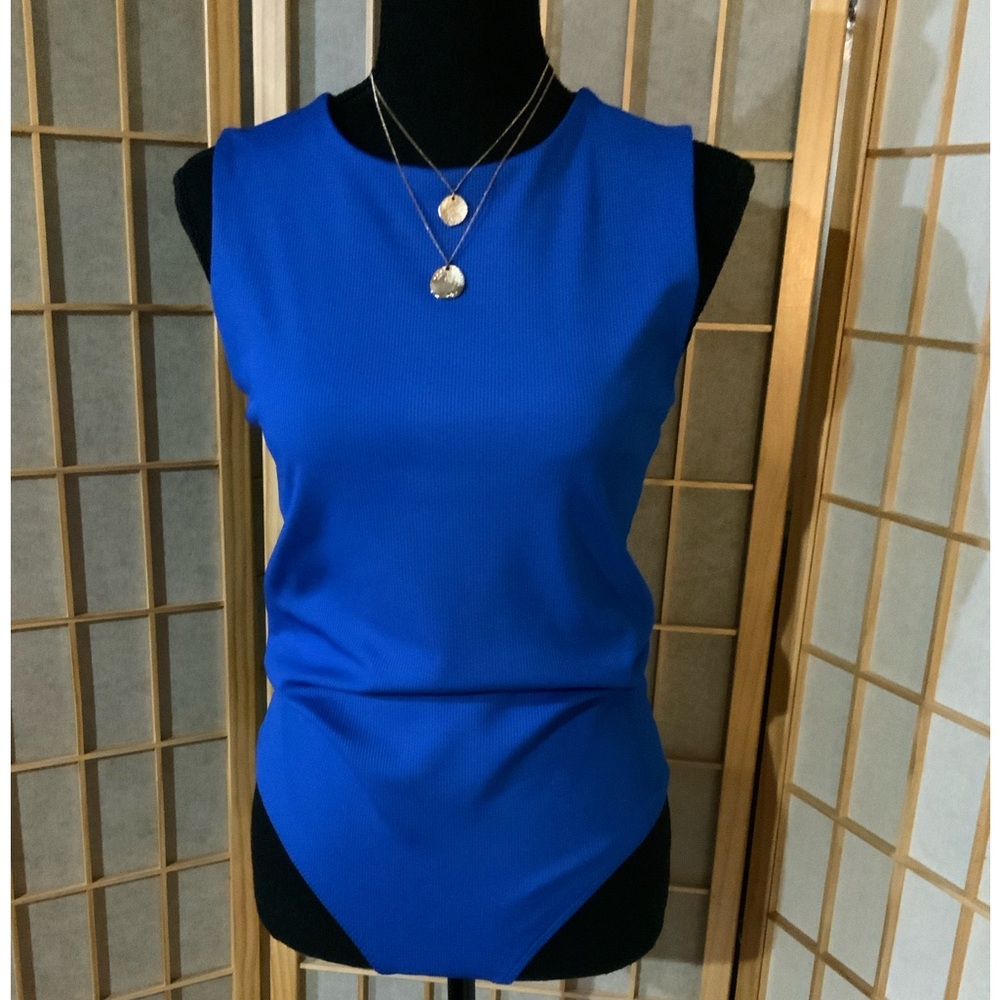 NWOT Sleeveless Royal Blue Women's Body contour bodysuit Top.
